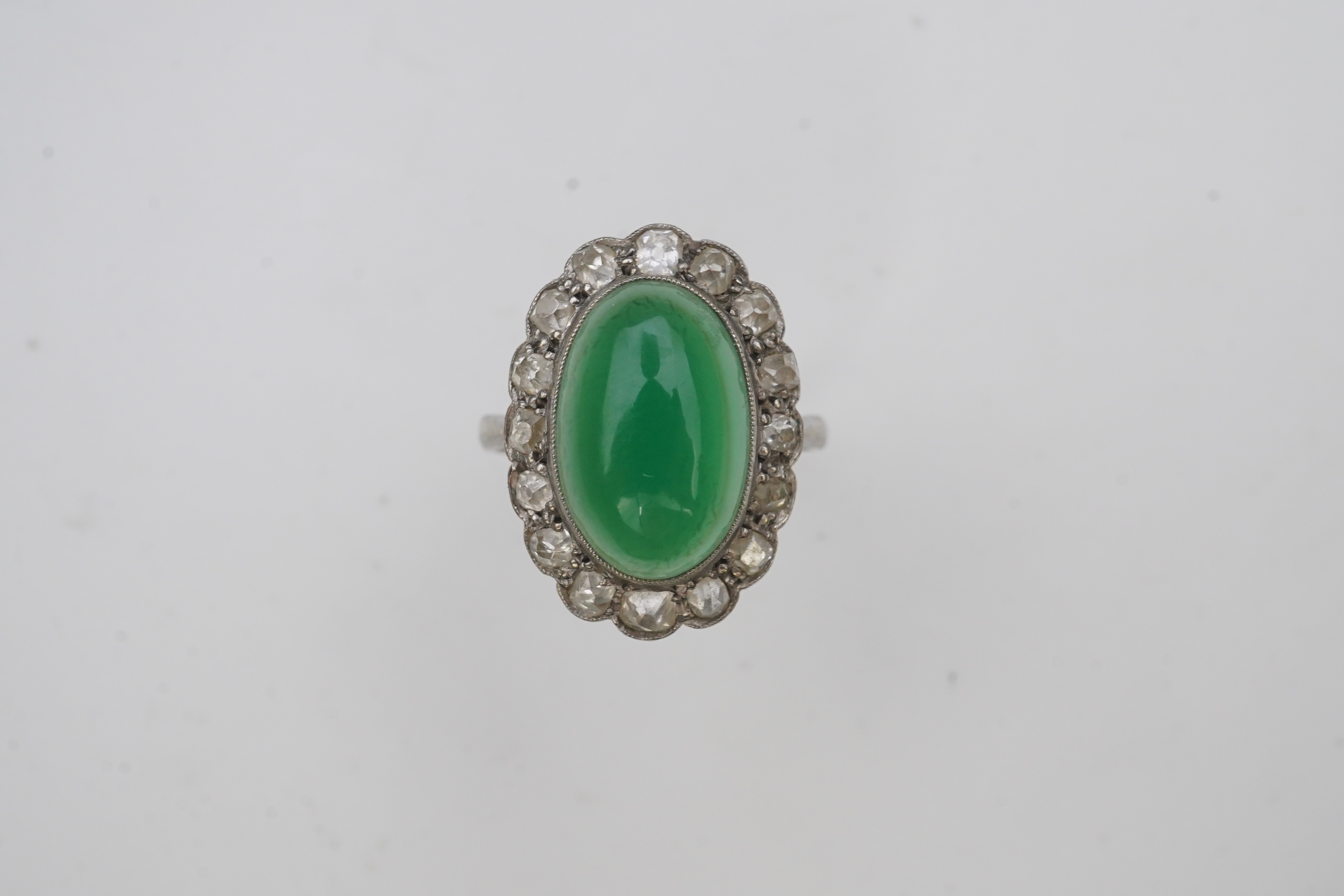 A green chalcedony and diamond ring, early 20th century